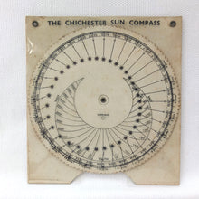 Vintage Chichester Sun Compass dial on a square beige backing card, photographed against a white textured background.