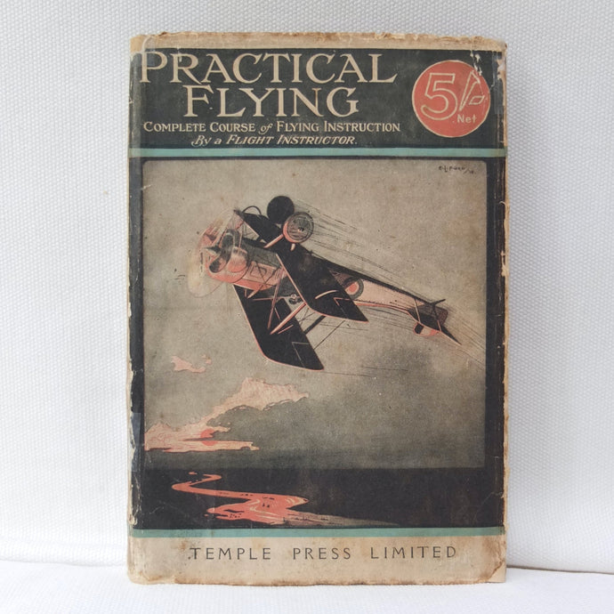 Vintage book titled 'Practical Flying' with an illustration of a pilot and airplane on the cover.